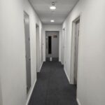 White Hallway with Grey Fire Doors